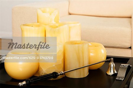 Candles in a tray on a coffee table