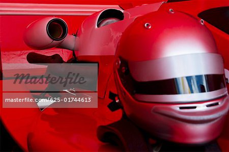 Close-up of a crash helmet on a racecar