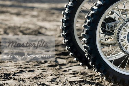 Close-up of tires of motorcycles