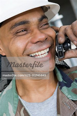 Close-up of a mature man talking on a mobile phone and smiling