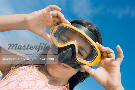 Download Low Angle View Of A Girl Wearing A Scuba Mask Stock Photo Masterfile Premium Royalty Free Code 625 01748880 Yellowimages Mockups