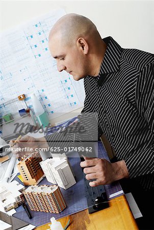 Side profile of an architect working in an office