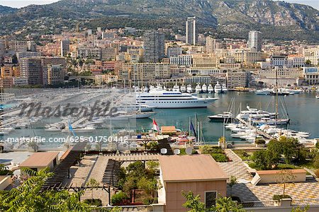 Ferries and boats docked at a harbor, Port of Fontvieille, Monte Carlo, Monaco