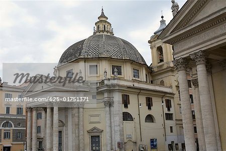 Low angle view of a church, Santa Maria Dei Miracoli, Santa Maria Di Montesanto, Piazza del Popolo, Rome, Italy