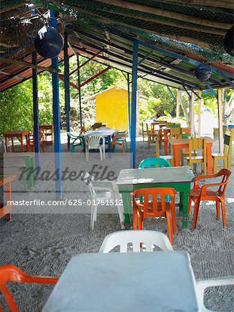 Empty tables and chairs in a restaurant, Providencia, Providencia y Santa Catalina, San Andres y Providencia Department,