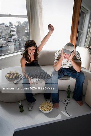 Couple Playing Video Game - Stock Photo - Masterfile - Premium