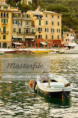 Boat moored at a harbor, Italian Riviera, Porticciolo, Portofino, Genoa, Liguria, Italy