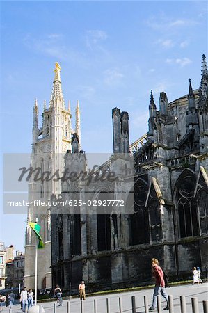 Group of people walking in front of a church, Cathedrale Saint-Andre, Tour Pey Berland, Bordeaux, Aquitaine, France