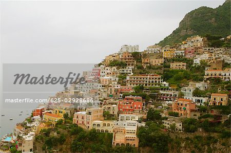 High angle view of town at the seaside, Positano, Amalfi Coast, Salerno, Campania, Italy
