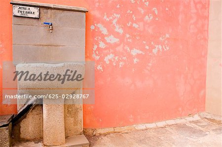 Drinking fountain on a wall, Cinque Terre, Manarola, La Spezia, Liguria, Italy
