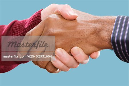 Close-up of two businessmen's shaking hands