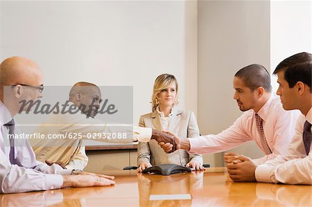 Business executives in a board room