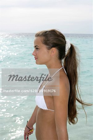 Teen Girl In A Bikini On The Beach Stock Photo, Picture and