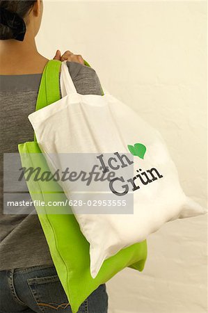 Woman carrying two shopping bags