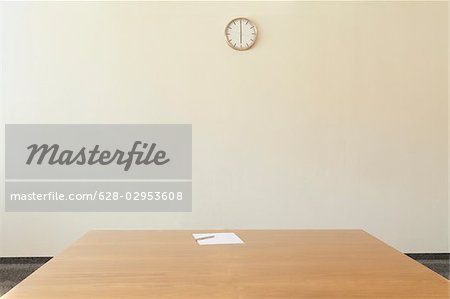 Empty conference room with wall clock, Munich, Bavaria, Germany