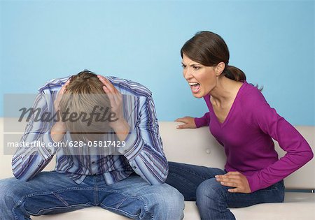 man yelling at woman