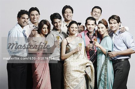 Portrait of a group of people holding drinks