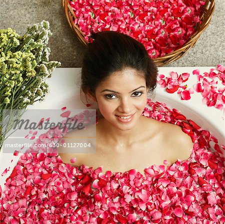 Bouquet of Roses. Bath with Rose Petals Stock Photo - Image of