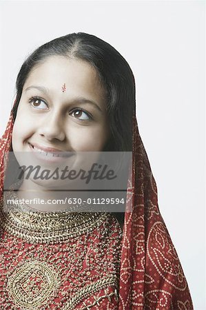 Close-up of a teenage girl looking up