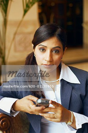 Portrait of a businesswoman holding a mobile phone