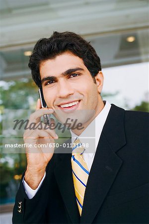 Close-up of a businessman talking on a mobile phone