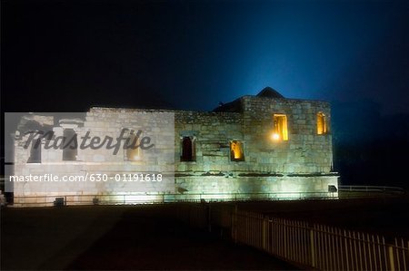 Monument lit up at night, Qutub Minar, New Delhi, India