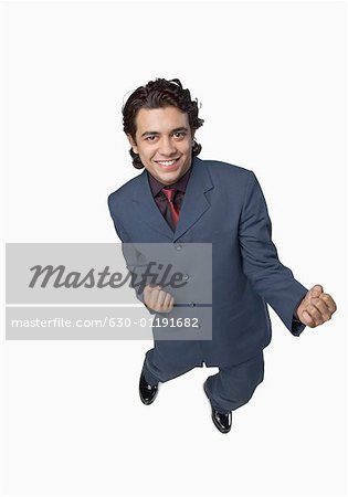 High angle view of a businessman clenching his fists