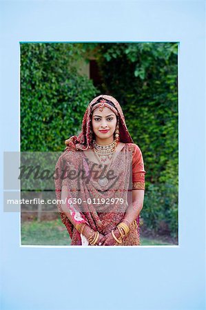 Portrait of a bride in a traditional wedding dress