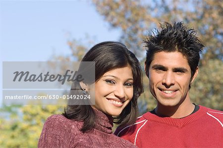 Portrait of a young couple smiling