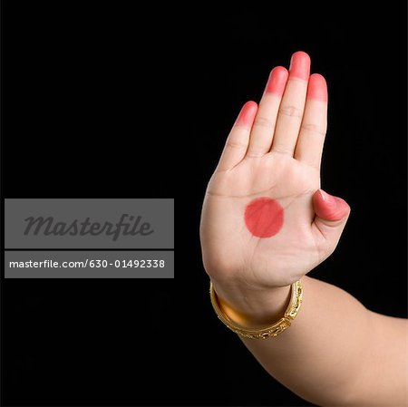 Close-up of a woman's hand making a Bharatnatyam gesture