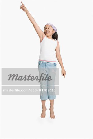 Girl pointing upwards
