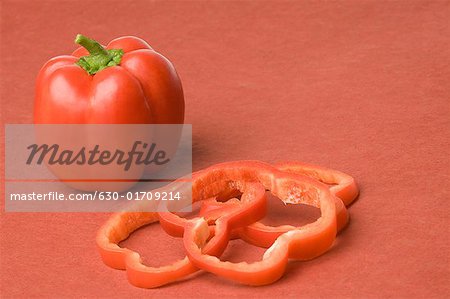 Close-up of a red bell pepper with slices