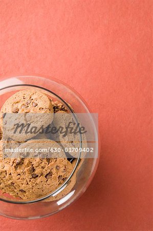 High angle view of brown biscuits in an open jar