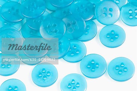 Close-up of sky blue buttons
