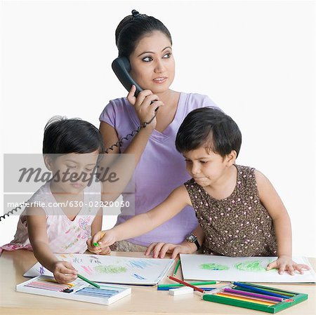 Two Girls Drawing Picture In Sketch Pad On Table Smiling High-Res Stock  Photo - Getty Images