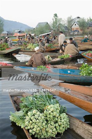 Group of people selling vegetables in boats, Dal Lake, Srinagar, Jammu and Kashmir, India