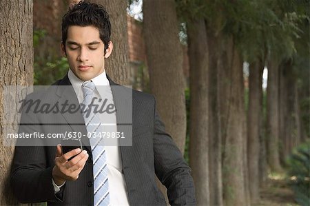 Businessman reading a message