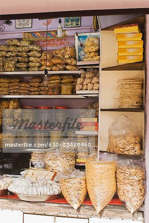 Food products for sale at a market stall, Delhi, India