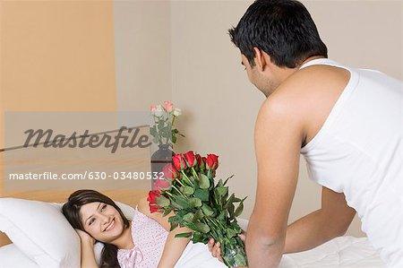 giving flowers to girlfriend