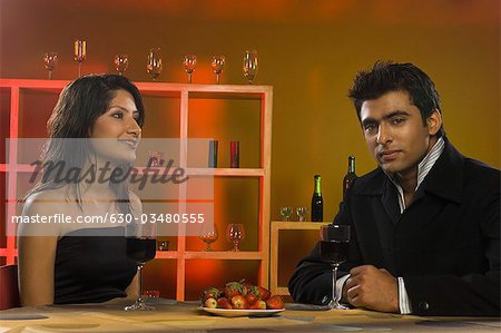 Close-up of a couple sitting in a bar