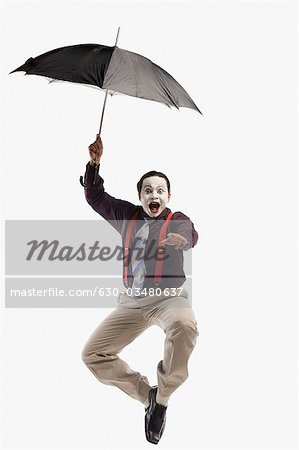Mime falling with an umbrella