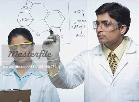 Scientists at work on a problem