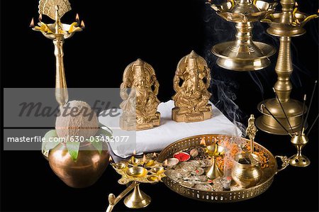 Diwali thali in front of idols of Lord Ganesha and Goddess Lakshmi - Stock  Photo - Masterfile - Premium Royalty-Free, Code: 630-03482077