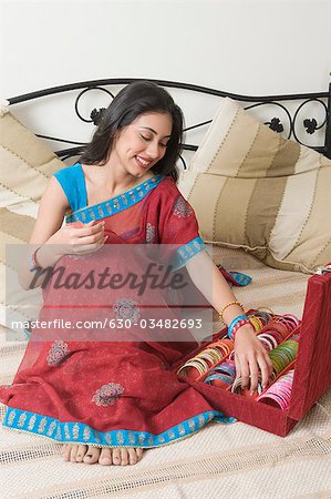 Woman choosing bangles