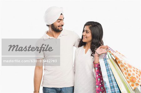 Couple standing together and smiling