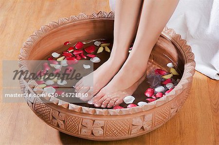 Woman getting a pedicure treatment