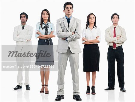 Business executives standing with arms crossed