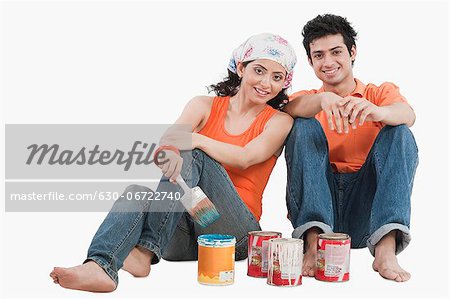 Couple with paint cans