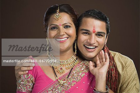 Portrait of a man and his mother smiling