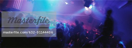 Crowd of people dancing at nightclub
